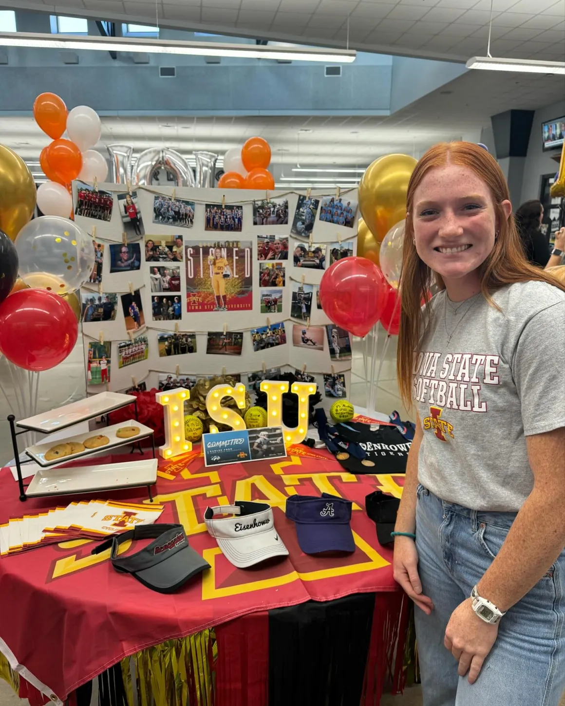 Wichita Parisi athlete celebrating her Iowa State softball signing